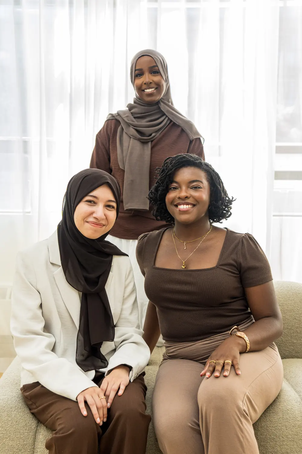 Three team members together in the practice studio